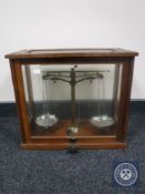 A set of cased chemist's scales
