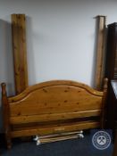 A contemporary pine 5' bed frame
