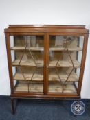 An Edwardian mahogany double door display cabinet