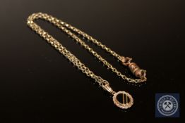 A 9ct gold and black onyx pendant on chain