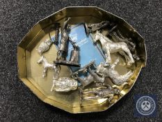 A tin containing ten pewter and metal figures including Royal Hampshire Craftsmen