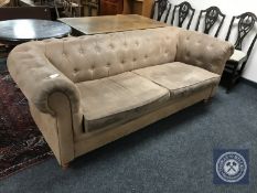 A button back Chesterfield style sofa in brown fabric