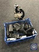 A basket containing a microscope by Beck of London and assorted cameras