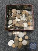 A tin containing a quantity of pre-decimal and decimal British coinage
