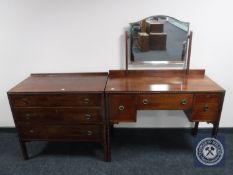 An early twentieth century mahogany dressing table with matching three drawer chest