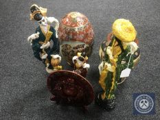 A Japanese lidded vase and a ceramic egg on stand,