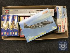 A box of plastic modelling kits of aircraft including Airfix,