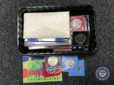 A tub containing a quantity of British crowns and coin sets, Cyprus, Malta,