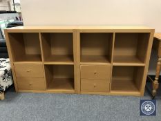 A pair of Ikea pine effect cube shelves