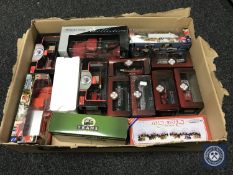 A collection of boxed die cast vehicles including Atlas fire engines,