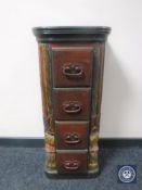 A painted hardwood narrow four drawer chest