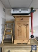 A pine bedside cabinet,