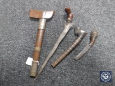 A late 19th/early 20th century Malayan kris, with 32cm wavy, damascened blade,