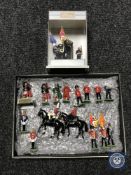 A box containing fifteen Britains lead figures, two on horseback,