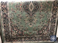 Five machine made rugs