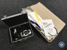 A Blade electric polystyrene glider together with a remote controlled helicopter in case