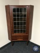 A Danish corner display cabinet