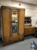 An early 20th century oak mirror door wardrobe and dressing chest CONDITION REPORT: