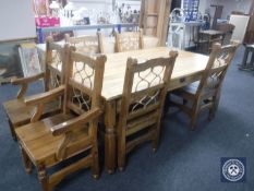 A pine farmhouse kitchen table fitted a drawer and six chairs