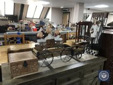 A contemporary metal and wood bicycle with trailer together with an eastern hardwood storage box,