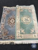 Two fringed Chinese rugs
