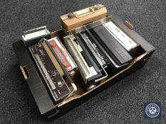 A box containing eight early transistor radios