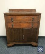 A 20th century oak linen chest
