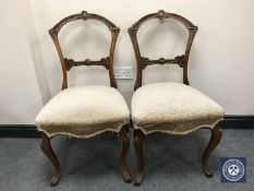 A pair of Victorian mahogany chairs