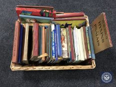 A wicker basket of mid 20th century and later children's books and annuals