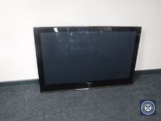 A Samsung 50 inch plasma TV with remote