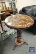 A Chinese inlaid hardwood occasional table on tripod base,