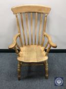 A pine farmhouse kitchen armchair