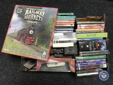 A box relating to railways containing DVDs, books,