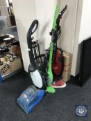 A Vax Rapide carpet washer and two steam mops