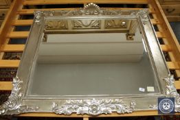 A Victorian style silvered overmantel mirror 123 cm x 119 cm