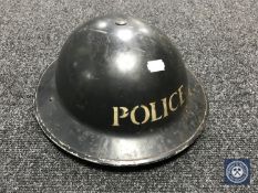 A WWII tin policeman's helmet