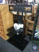 A Mountright three tier TV stand and TV mounting bracket