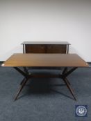 A mid 20th century teak sideboard together with a dining table
