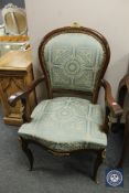 A reproduction ormolu mounted armchair,