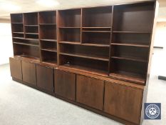 A pair of bookshelves fitted cupboards below CONDITION REPORT: Each measures 189cm