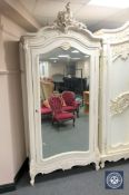 A white painted mirror door French armoire CONDITION REPORT: 235cm high by 110cm
