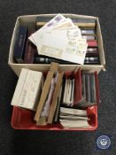 Two boxes of assorted stamp albums and stamps,
