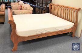 A 6' rail sleigh bed with Tempur mattress
