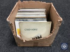 A box containing LP's to include The Who,