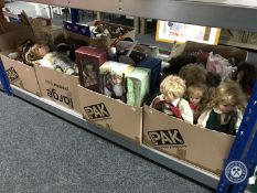 Four boxes of boxed and unboxed collector's dolls