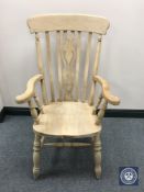 A pine farmhouse kitchen armchair