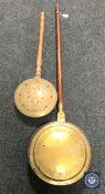 Two brass bed warming pans