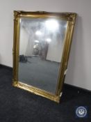 Two gilt framed bevelled mirrors CONDITION REPORT: These measure 75cmX106cm,