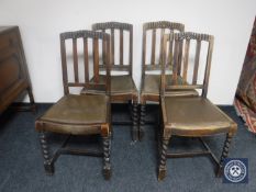 Four oak dining chairs