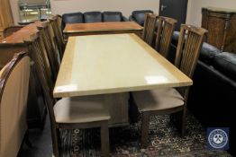A contemporary marble effect dining table, 180 cm x 100 cm,